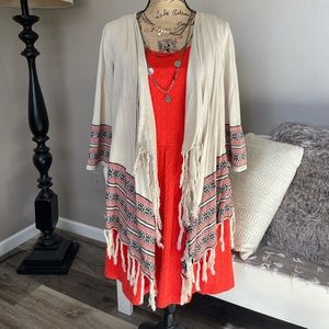 Cream colored cardigan with stylish fringe :)